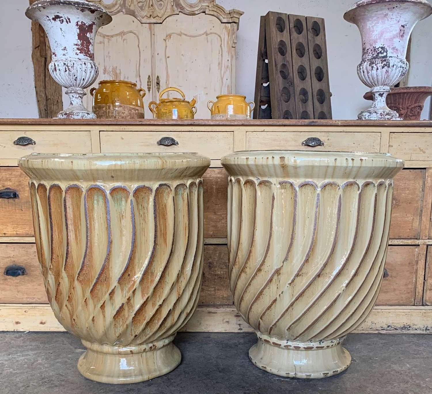 LARGE PAIR OF ANDUZE TERRACOTTA PLANTERS